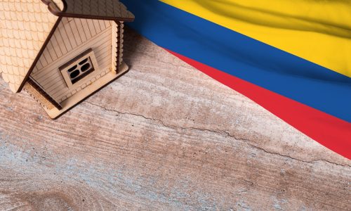 House,Model,Near,Colombia,Flag.,Real,Estate,Sale,And,Purchase