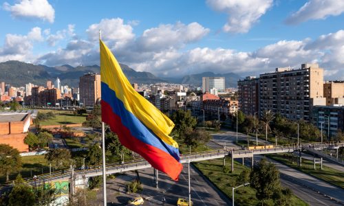 Photo,Of,The,Colombian,Flag,On,A,Pole,With,Avenue